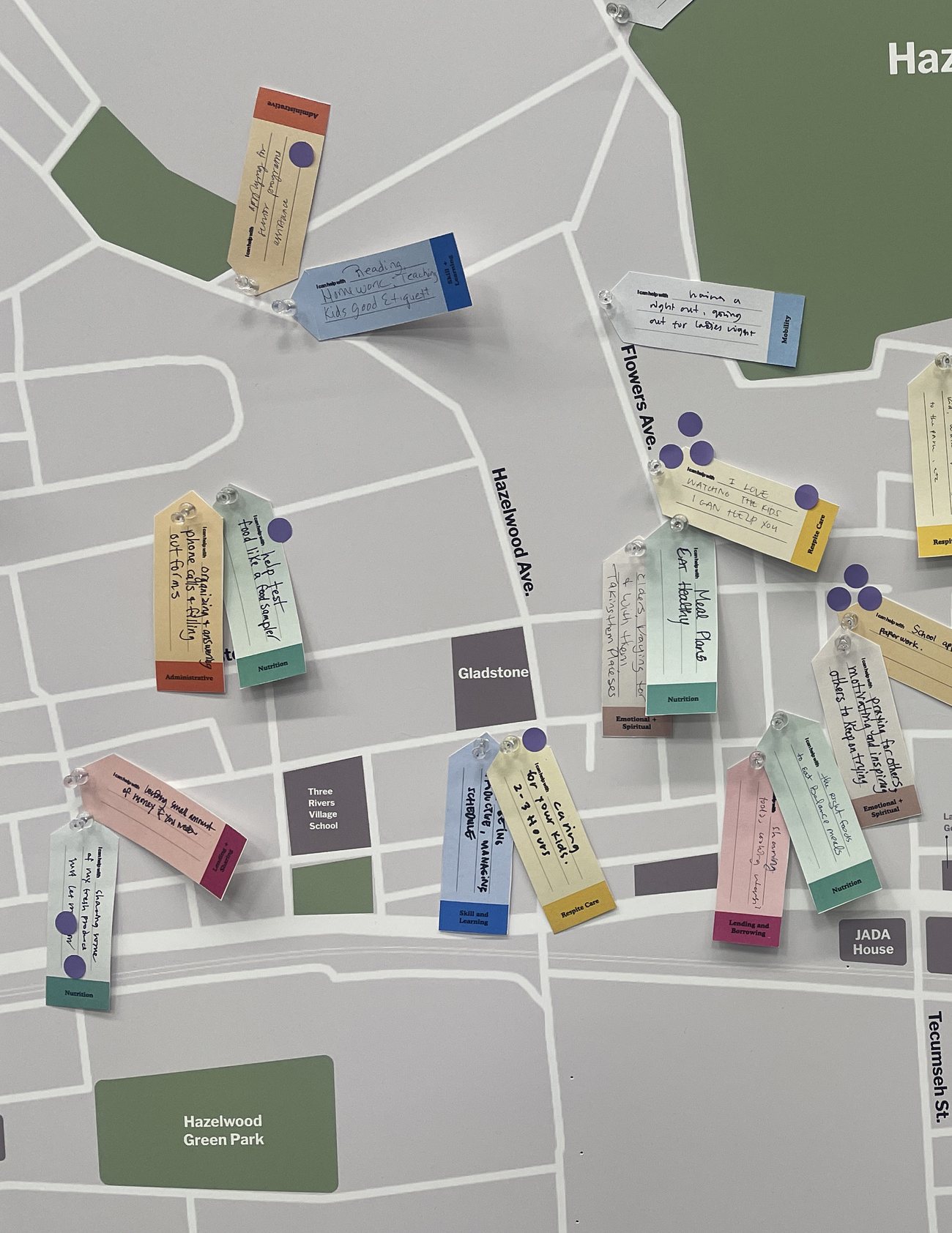 A map of Hazelwood covered with small colored magnetic cards
