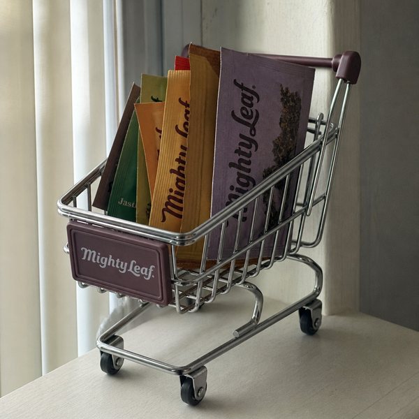Step 1: the same tea packets in a small shopping cart