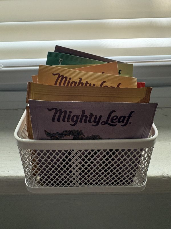 Original photo: tea packets in a wire basket