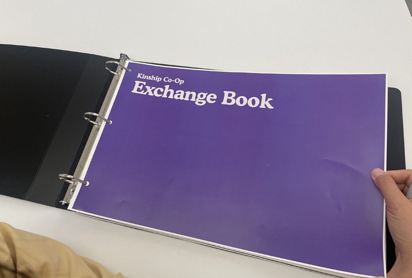 The purple Exchange Book binder